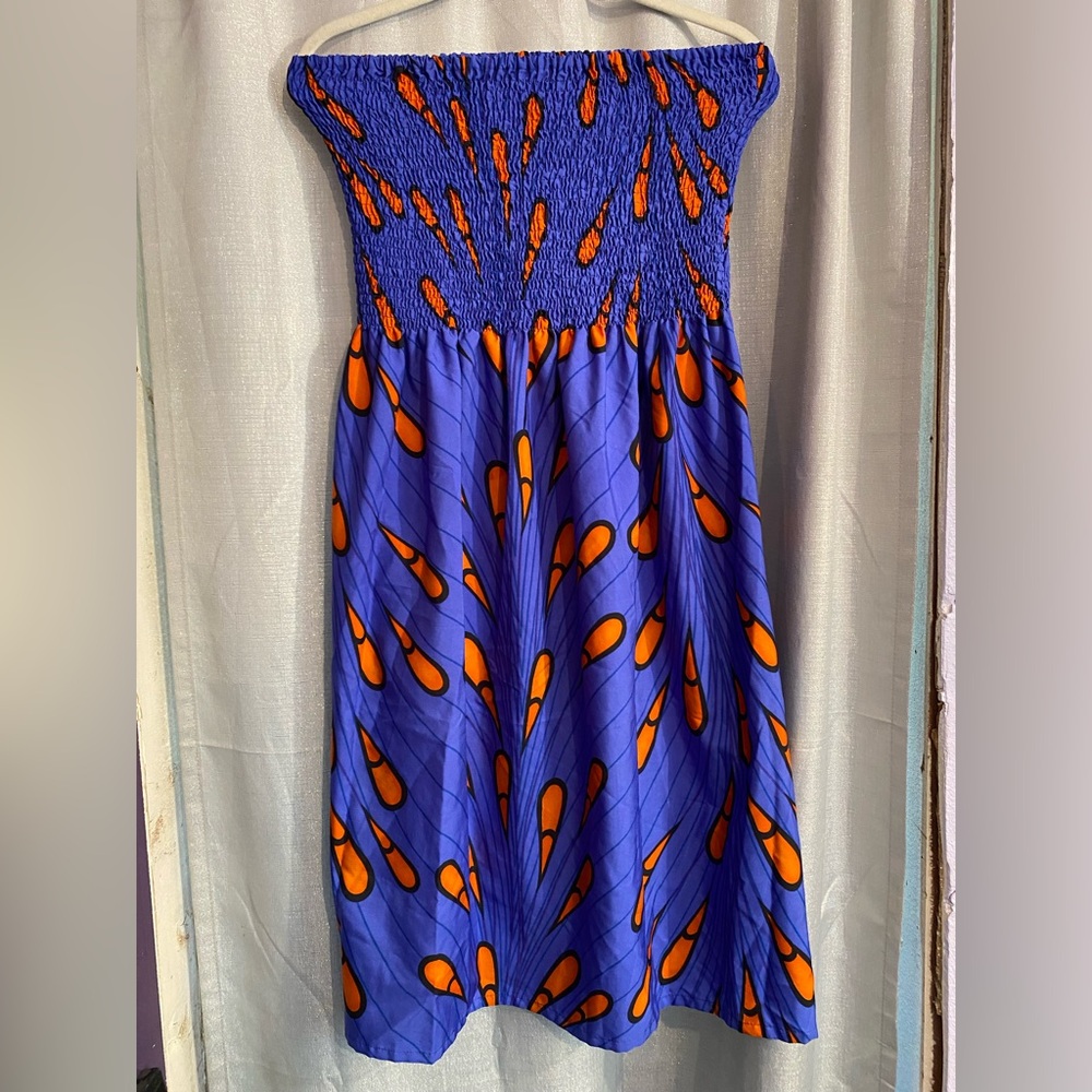 Festival wear Gypsy blue TRIBAL PRINTED BLUE
POLYESTER TUBE STRAPLESS DRESS